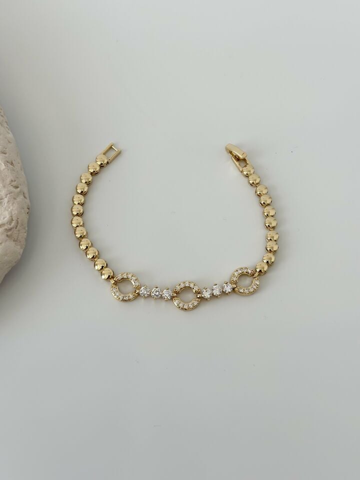 Gold Renk Zirkon Taşlı Halka Figürlü Topçuk Model Bileklik