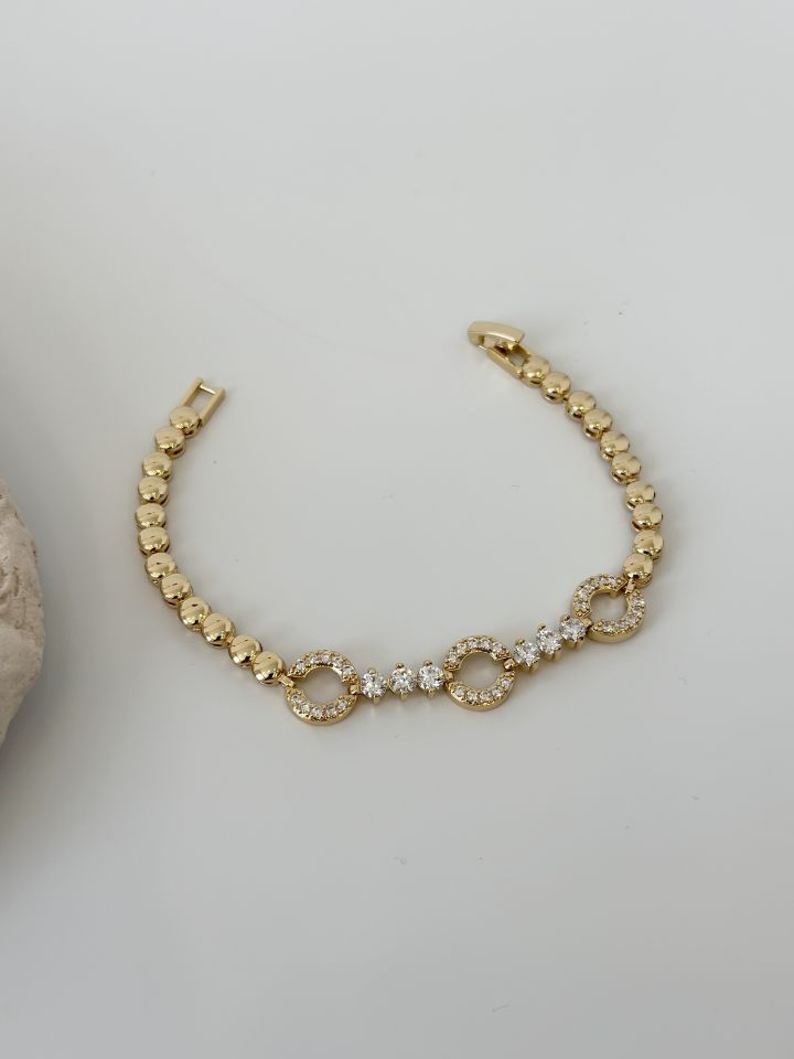 Gold Renk Zirkon Taşlı Halka Figürlü Topçuk Model Bileklik