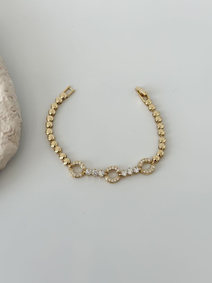 Gold Renk Zirkon Taşlı Halka Figürlü Topçuk Model Bileklik