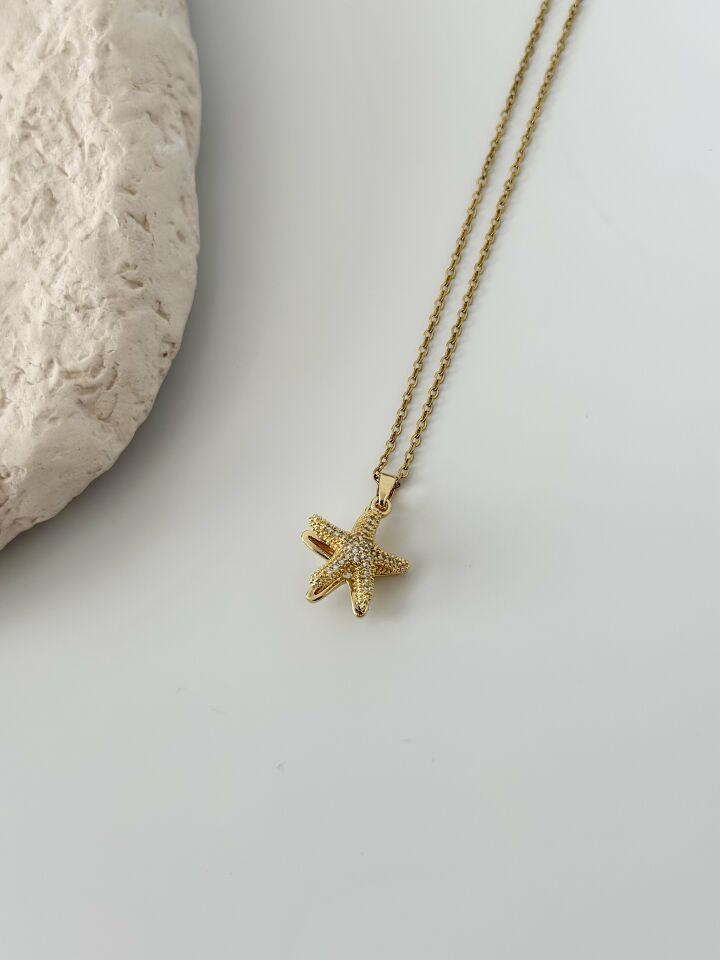 Çelik Gold Renk Zirkon Taşlı Açılır Deniz Yıldız Model İnci Detay Kadın Kolye