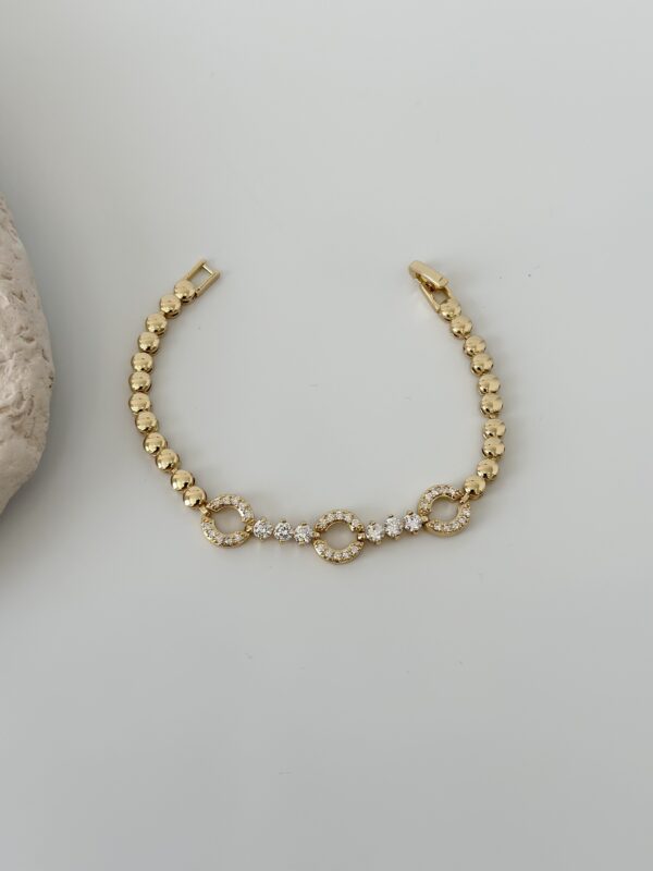 Gold Renk Zirkon Taşlı Halka Figürlü Topçuk Model Bileklik