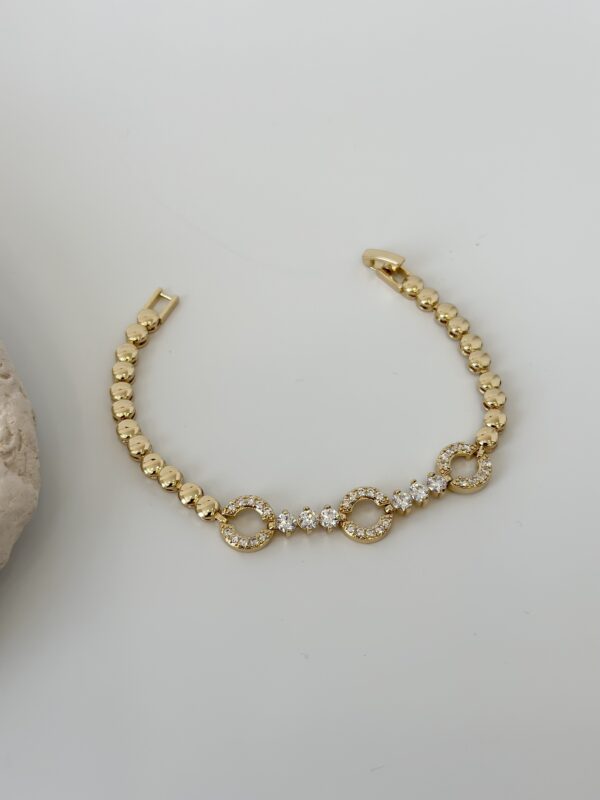 Gold Renk Zirkon Taşlı Halka Figürlü Topçuk Model Bileklik