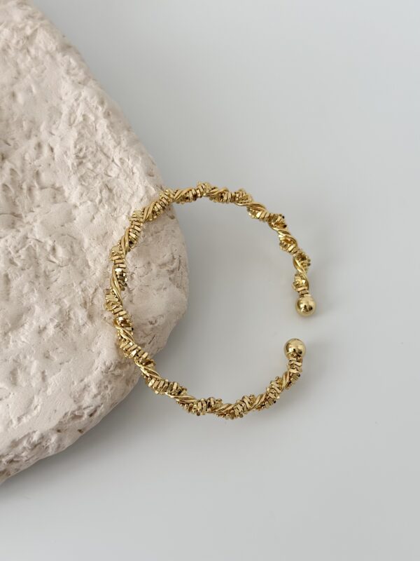 Çelik Gold Renk Sarmal Dorika Model Kadın Bileklik