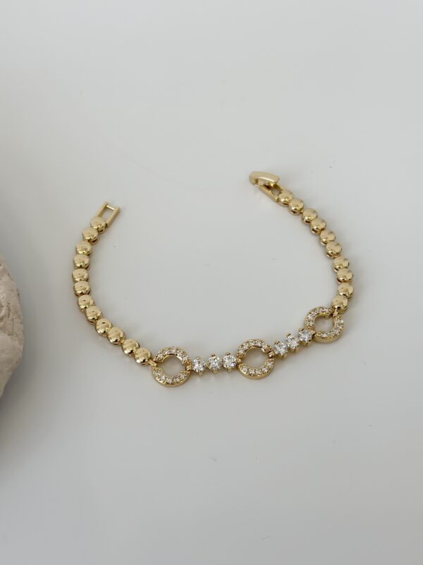 Gold Renk Zirkon Taşlı Halka Figürlü Topçuk Model Bileklik