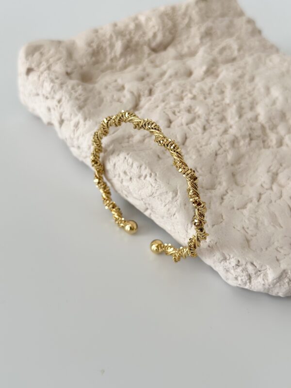 Çelik Gold Renk Sarmal Dorika Model Kadın Bileklik