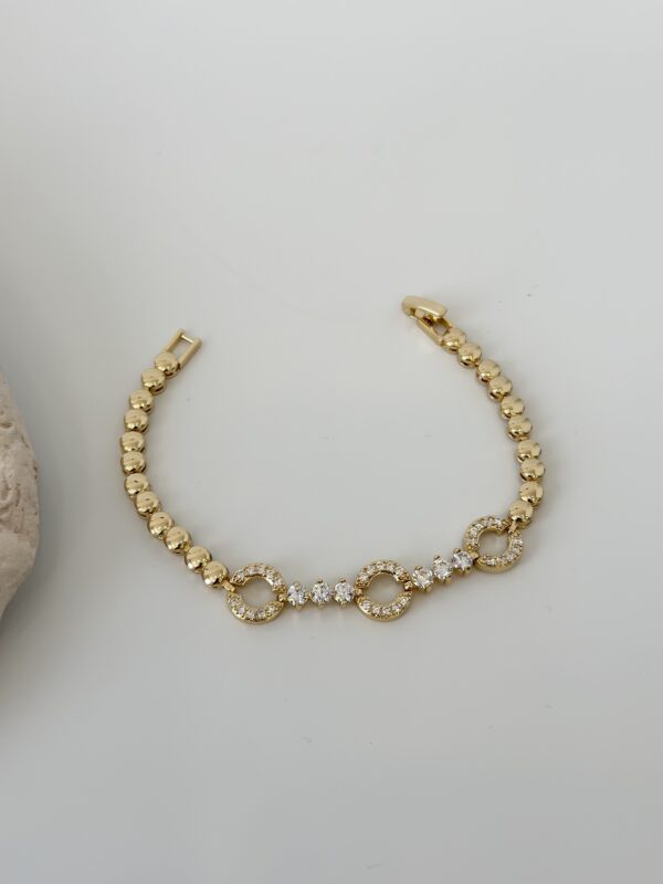 Gold Renk Zirkon Taşlı Halka Figürlü Topçuk Model Bileklik