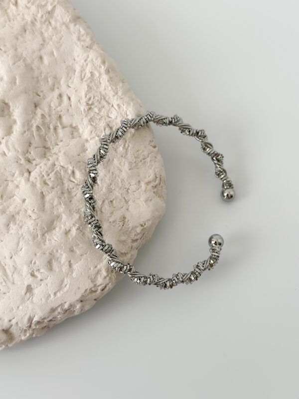 Çelik Gümüş Renk Sarmal Dorika Model Kadın Bileklik