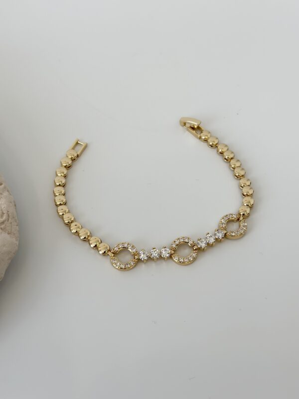 Gold Renk Zirkon Taşlı Halka Figürlü Topçuk Model Bileklik