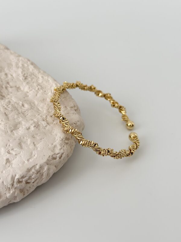 Çelik Gold Renk Sarmal Dorika Model Kadın Bileklik