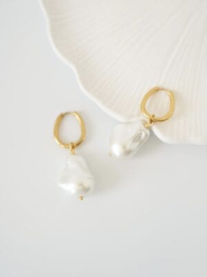 f7ff76bb8e6b95fee716ca474dffe193.jpg Barok İnci Küpe