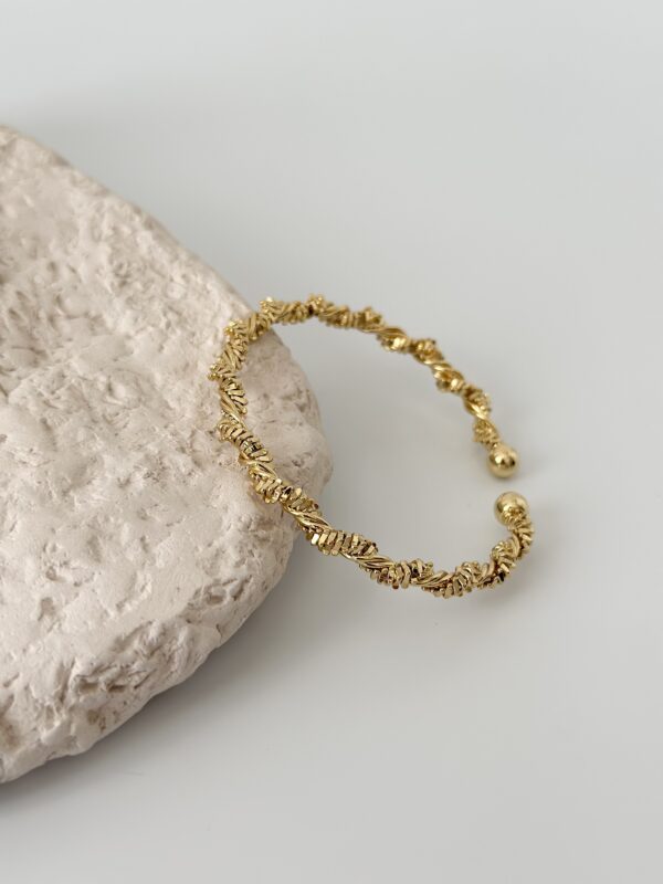 Çelik Gold Renk Sarmal Dorika Model Kadın Bileklik